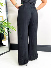 The Flo - Pleated Trousers