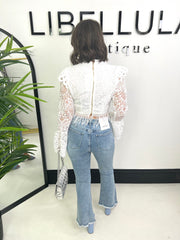 The Valeria - Flared Distressed Jeans