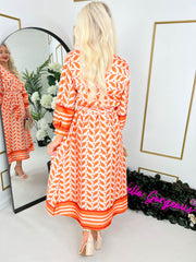 The Caitlin - Orange Abstract Midi Dress