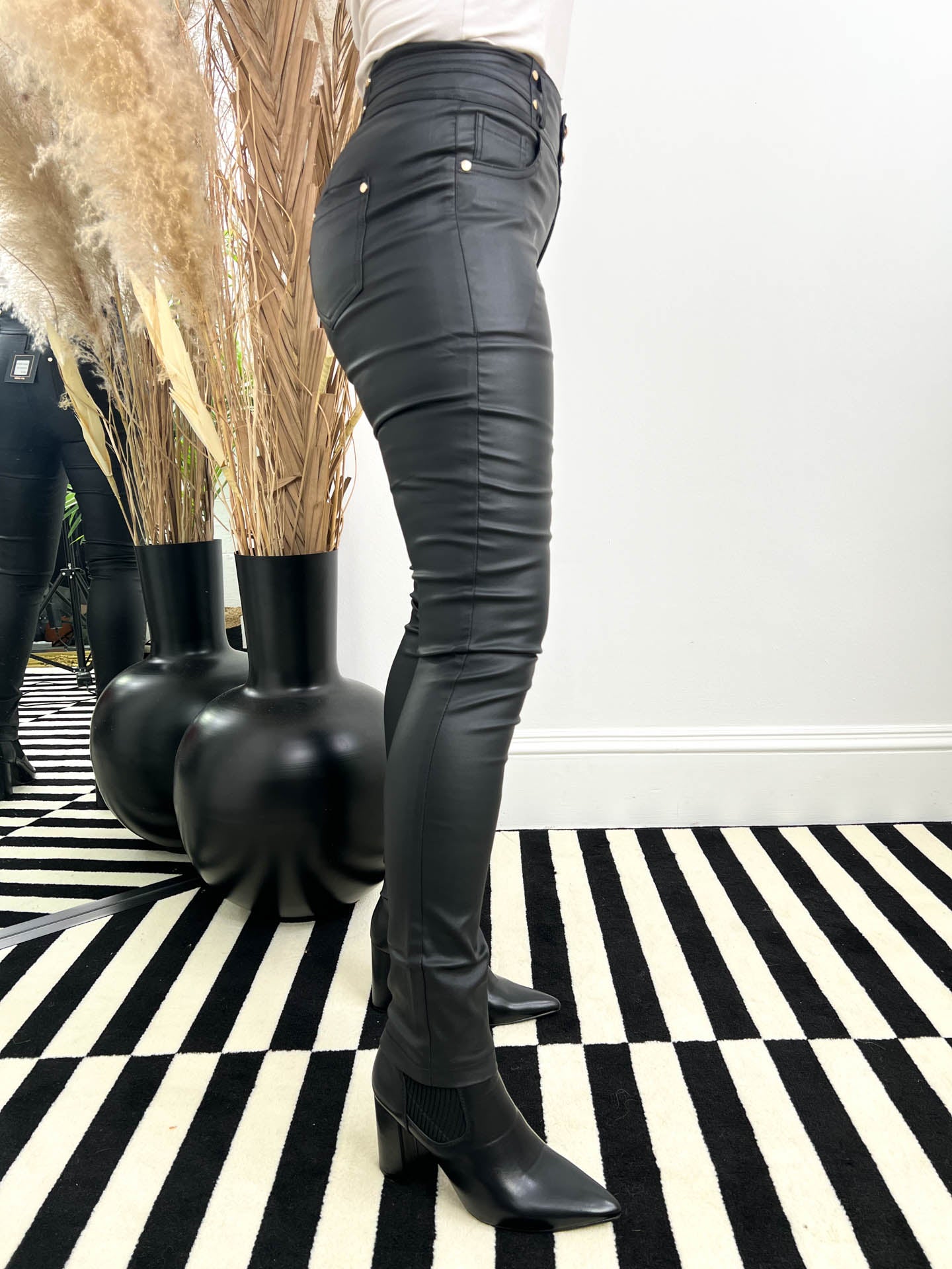 The Kaci- Black Faux Leather Trousers with Gold Button Details