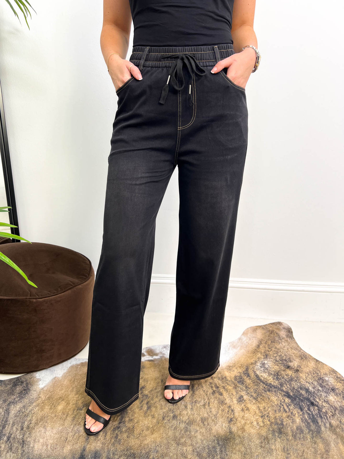The Milly - Faux Denim Trousers in Black